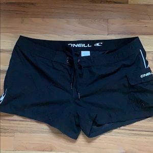 O’Neill black and white board shorts.